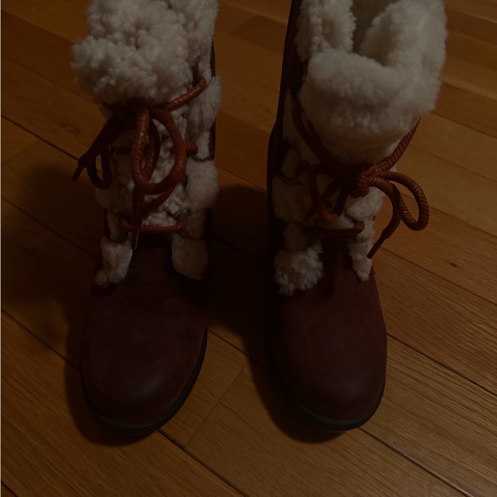 Sorel women’s burgundy and White Fur-Lined wedge Boots